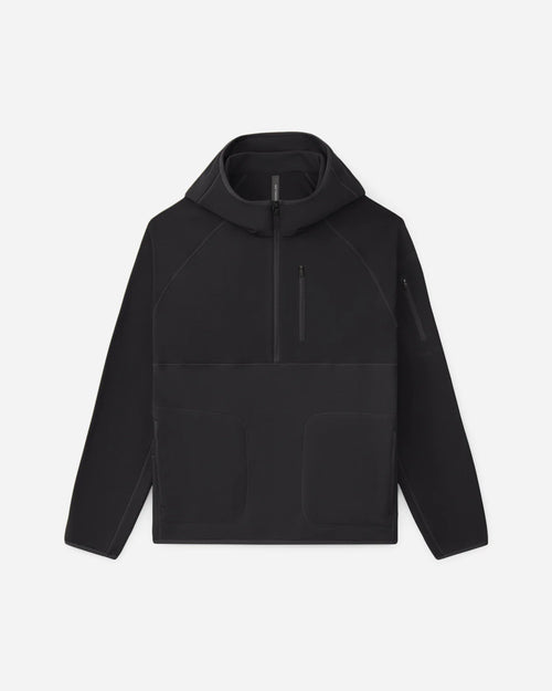 Ocon's Creations Tactical Hoodie in olive green, full zip design with adjustable hood, worn on a shooting range.